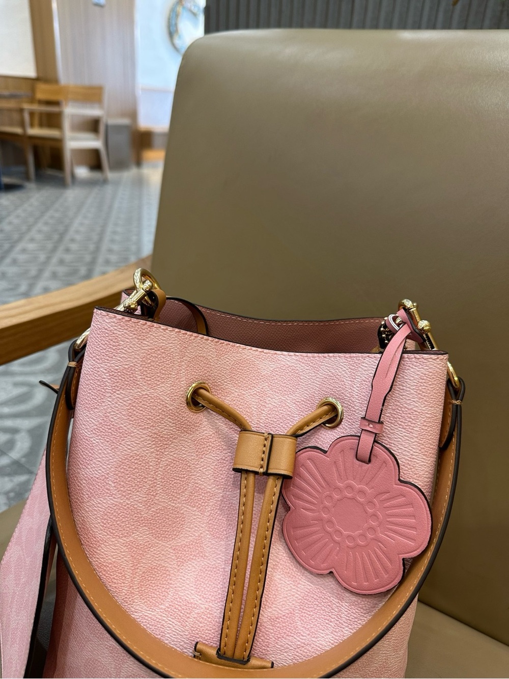 Coach Pink Pebble Leather Drawstring Bucket Bag with Tan Trim and Floral Charm - Picture 5 of 9